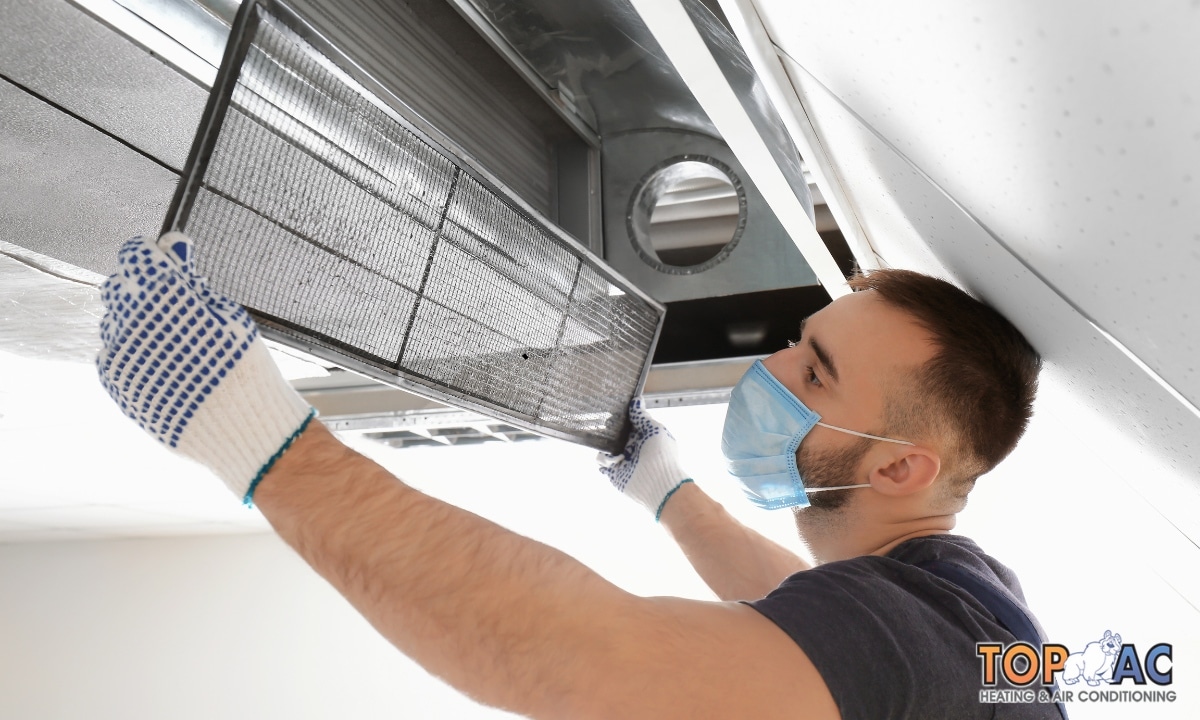 Damaged air duct being repaired in Los Angeles.