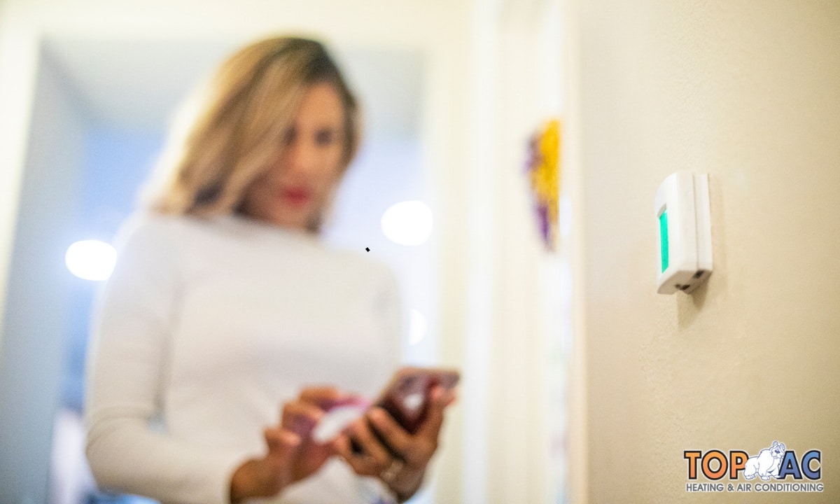 Installing a digital thermostat in Los Angeles for improved comfort.