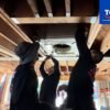 HVAC technician discussing a maintenance plan with a Los Angeles homeowner