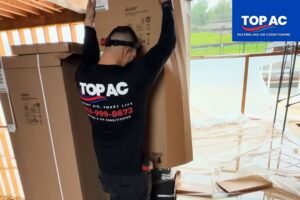 HVAC technician servicing a duplex system in North Hills, CA