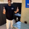 HVAC technician servicing a residential system in Thousand Oaks, CA