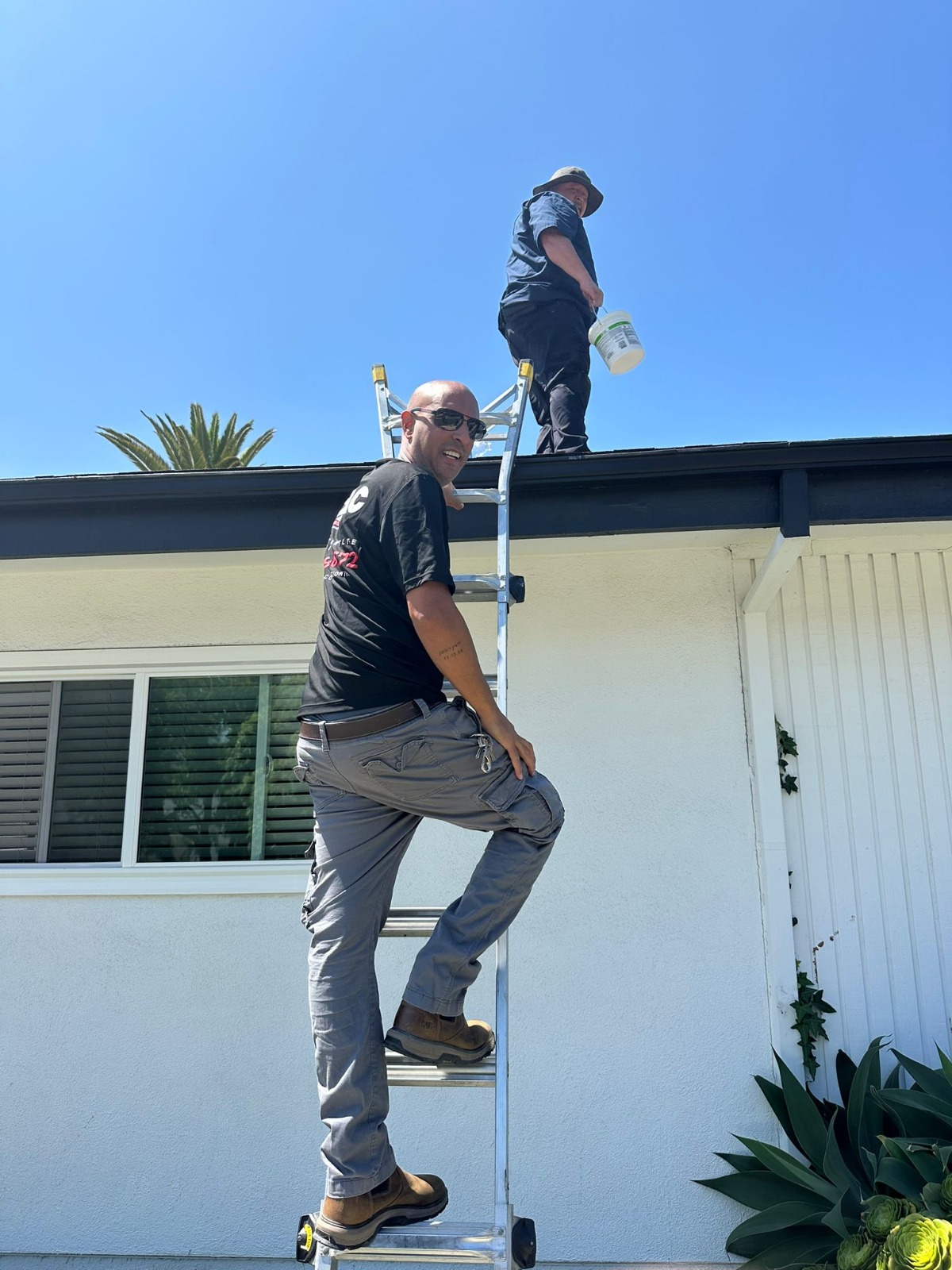 TOP AC technician completing an HVAC repair for a Sherman Oaks CA home