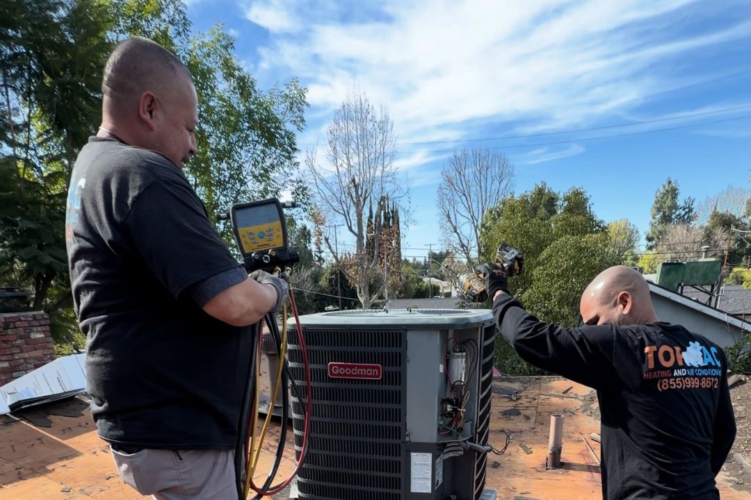 TOP AC technician completing an HVAC repair for a Panorama City CA home